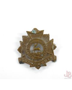 WW1 Bedfordshire Regiment Cap Badge. Pin missing. Order of the Garter Moto