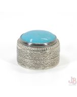 Silver (900) trinket / pill box with turquoise cabochon

