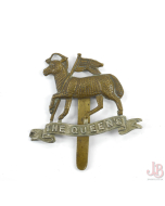 A vintage WW1 Cap badge - The Queen’s Regiment Royal West Surrey - two tone

